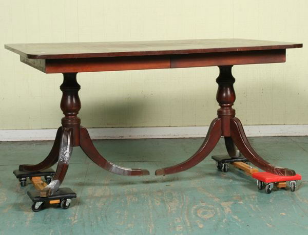 Nine piece mid 1900's Duncan Phyfe style dining s: Nine piece mid 1900's Duncan Phyfe style dining suite, mahogany, (1) double pedestal table, reeded saber legs, 40" x 60" one 12" leaf 30"t, (2) six lyre back chairs, one arm, (3) 60" buffet 34"t, (4)