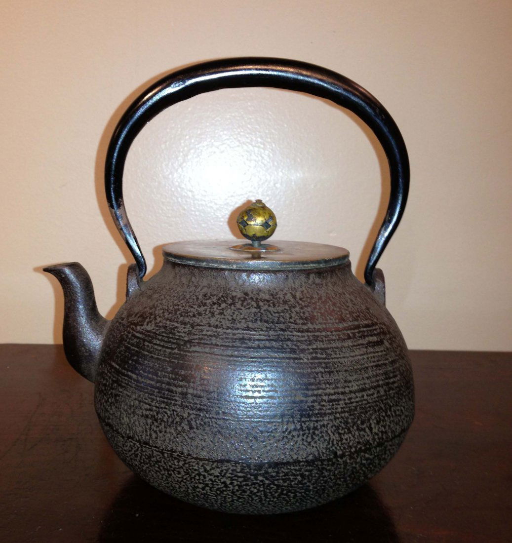 Japanese Antique Tetsubin Iron Teapot: Japanese antique tetsubin Iron tea pot ,Material:Iron and Bronze LidAgeLate Meiji to Taisho 1890-1920,SizeW 6 3/4 x D 5 3/4 x H 8 inchesshipping and handling domestic $35
