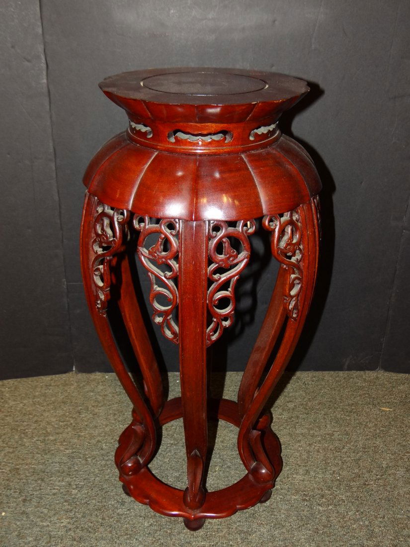 Chinese Rosewood Flower Stand: MaterialRosewoodAgeEarly to Mid. 1900SizeDia. 12 1/4 x H 24 inches****S&H CHARGE WITHIN MAINLAND US $95