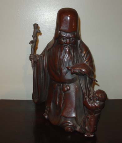 Chinese longevity god shou xing with a child, turtle: Material : Metal. Size: W 10 x D 4 x H 15 inches. Age: early to mid. 1900