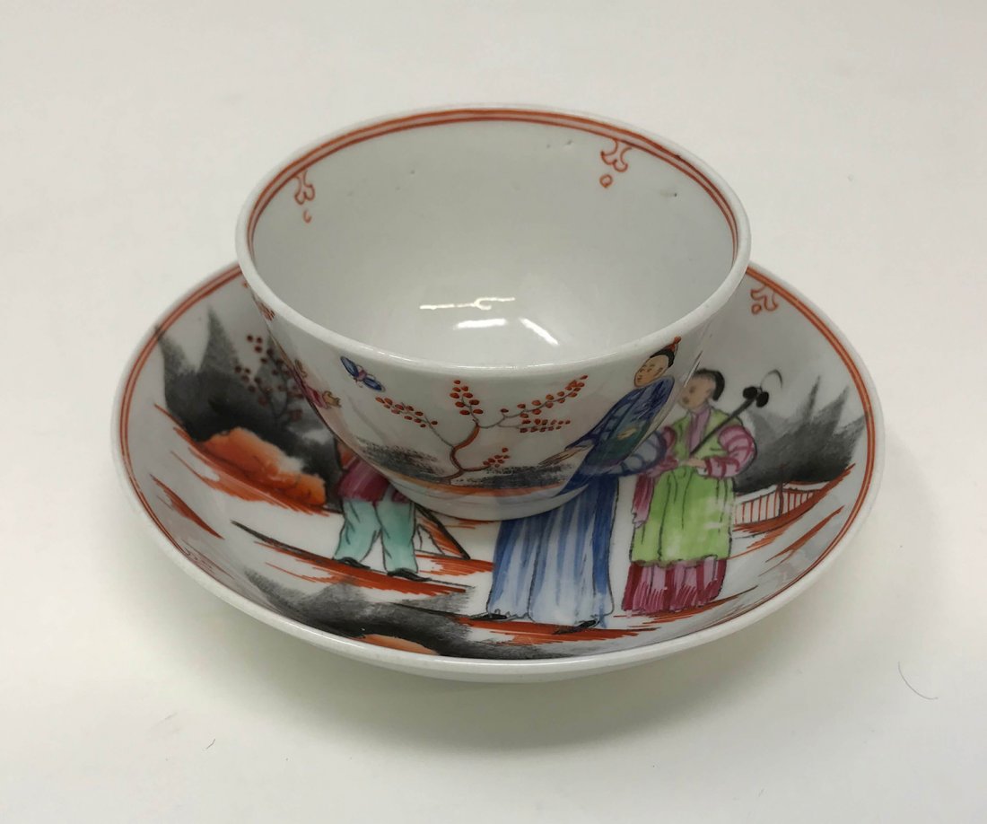 Chinese Fine Family Rose Tea Cup: Very fine Chinese family rose porcelain tea cup and saucer depicting poeple in a landscape. The saucer measures 5 inches in diameter and the cup measures 2 inches tall x 3 1/4 inches in diameter.