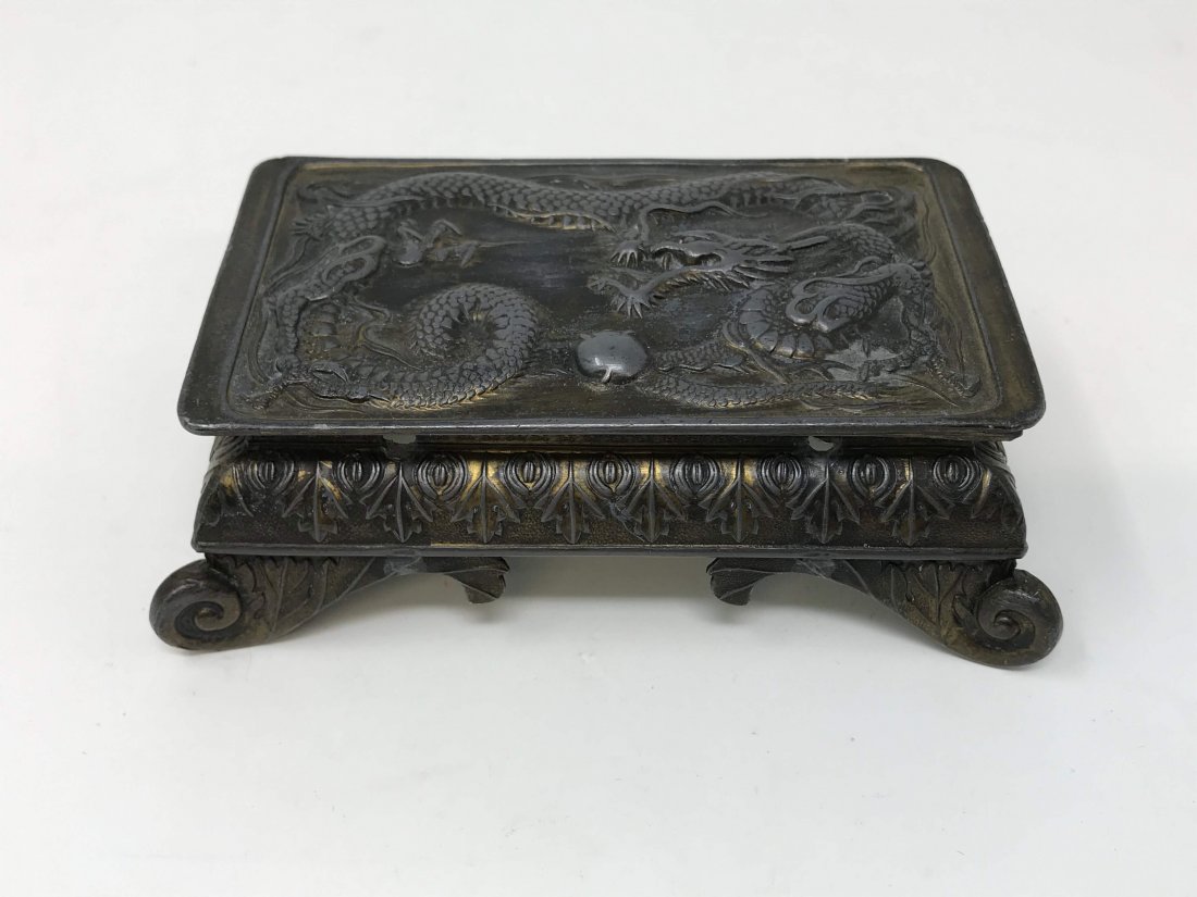 Antique Chinese dragon inkwell: Fine metal and glass insert dragon inkwell measuring 5 inches long x 2 inches wide x 1 3/8 inches tall. No mark.
