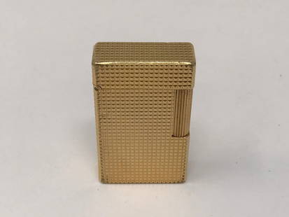 S.T. Dupont Paris Gold Plated Lighter: S.T. Dupont Paris gold plated 20 micron used lighter. Needs to be refilled, marked at the bottom.