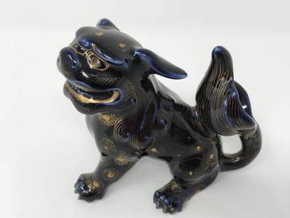 Chinese Antique Mythical Dark Blue Gilt Beast: Chinese antique mythical dark blue gilt porcelain foo dog. Measures 3 1/8 inches x 3 1/2 inches x 2 1/4 inches. No mark.