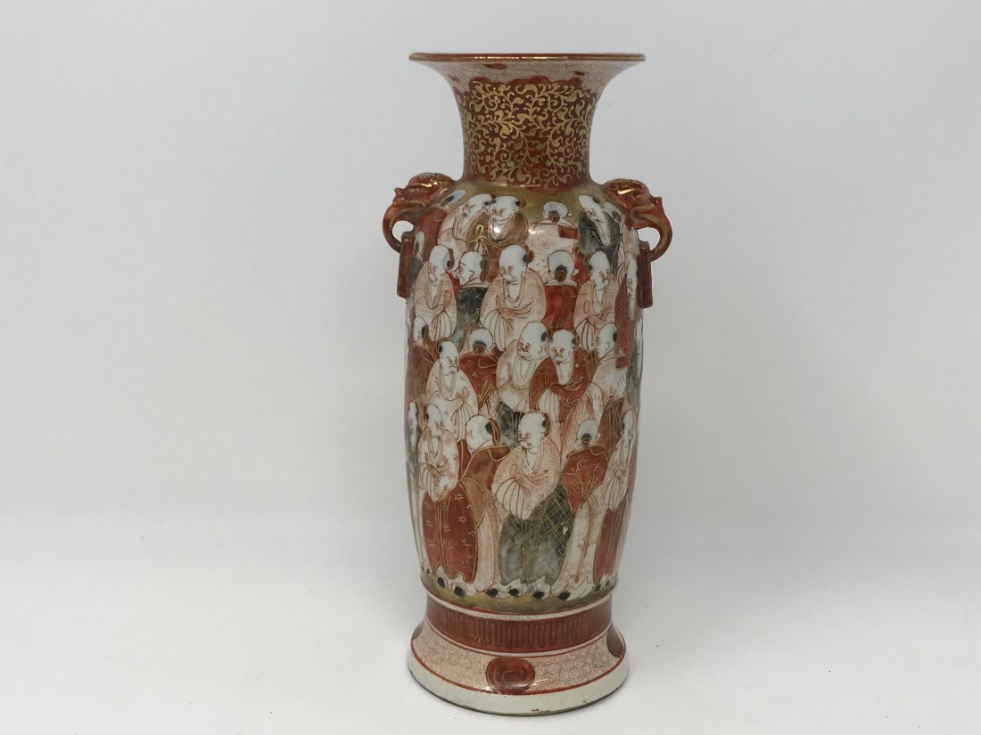 Antique Japanese Kutani Vase: Antique Japanese Kutani vase with hand painted figures. Signed on the base, measures 8 1/8 inches tall. In good condition.