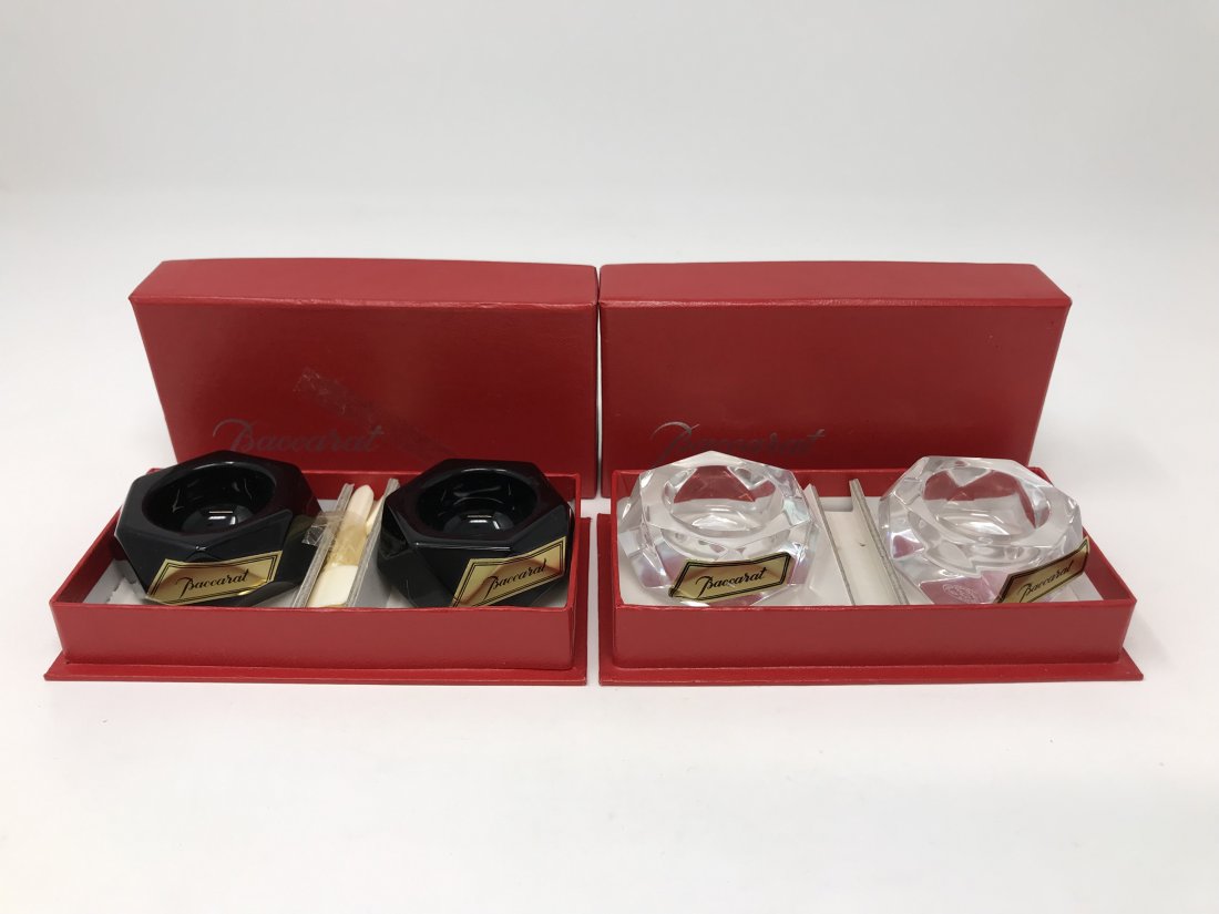 Baccarat France Clear & Black Crystal Open Salt: Two pair of Baccarat France clear & blakc crystal open salt with boxes. The black set comes with bone spoons. The cellars measures 2 1/4 inches each one. Good condition.