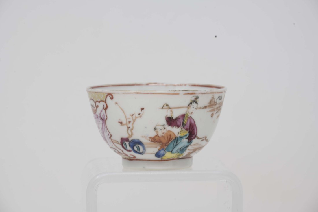 18th century Rose Family Chinese Porcelain Cup: Late 18th century Chinese Rose Family porcelain tea cup decorated with lady and children s in a landscape. Measures 1 3/4 inches x 3 inches in diameter. In good condition, minor unpainted spot visible