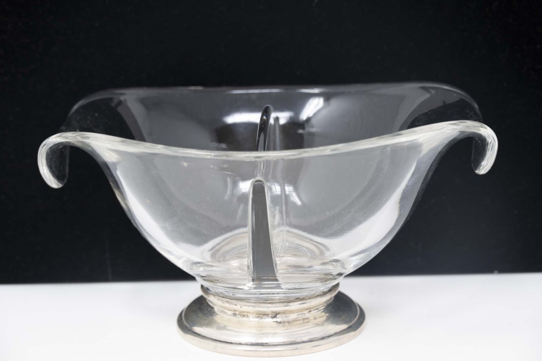 Vintage Art Glass & Sterling Candy Bowl: Vintage art glass and sterling silver base double candy bowl. Measures 7 1/2 inches in length x 5 1/8 inches wide x 3 1/2 inches. Marked sterling at the base. In good condition.