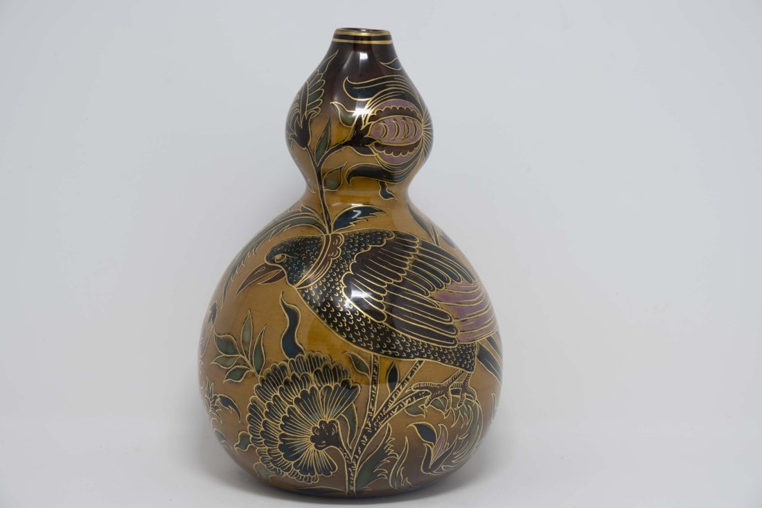 Zsolnay Pecs Gourde Vase Japanese Flower Bird Design: Porcelain faience with coloured glaze, Japanese style decoration bird and flowers. Numbered at the base, Zsolnay Pecs impressed mark and designer signature. Measures 8 inches in good condition.