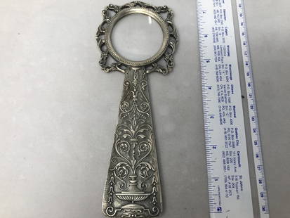 Large 800 Silver Magnifying Glass: Large solid 800 silver magnifying glass Italy Rali Benvenuto di Emilia maker mark. Measures 7 1/2 inches long, weighs 180 grams.