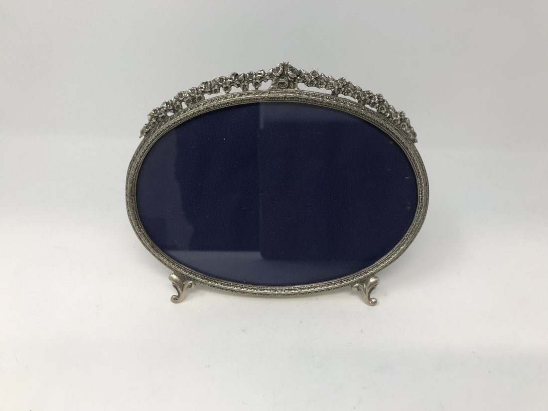 800 Silver Oval Standing Mirror with Blooming Roses: 800 silver oval standing mirror with blooming roses crown and velvet back stand stamped 800 VT. Measures 4 3/4 inches x 6 1/4 inches wide.