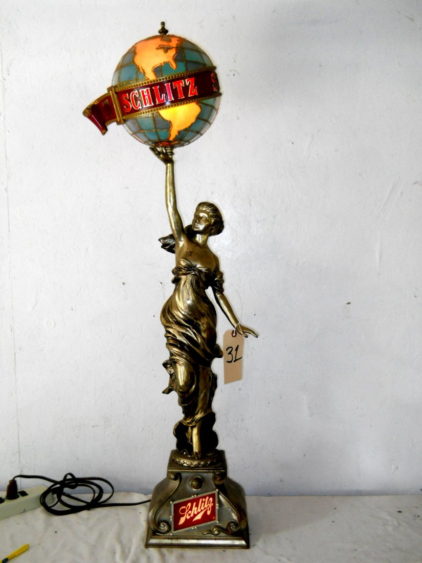 SCHLITZ BEER Sign: Vintage SCHLITZ Lady holding Globe on pedestal. Great condition. 45” H x 9” W