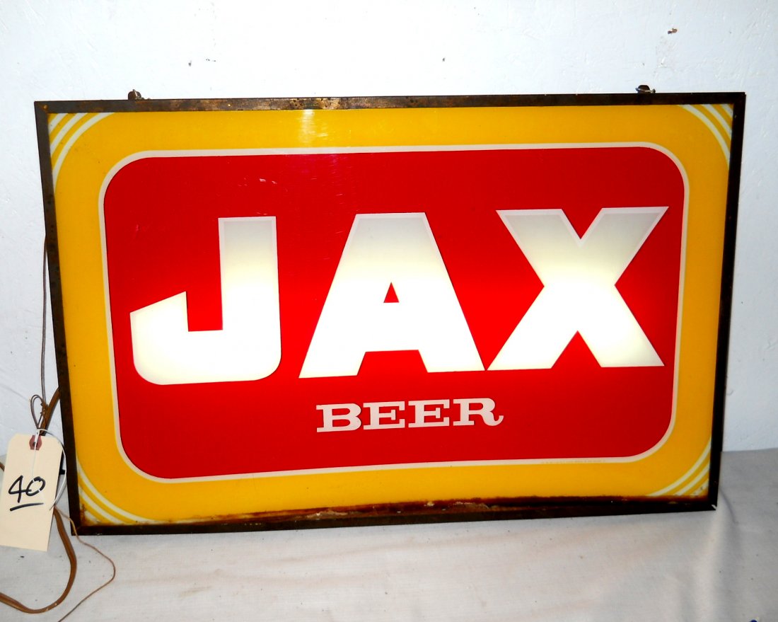 JAX BEER Light Up Sign: Vintage JAX BEER Light Up Sign. Jax Beer light up sign with yellow and red logo and welcome sign on back. It reads “Welcome, we invite you to enjoy our hospitality and good cheer along with a sparkl