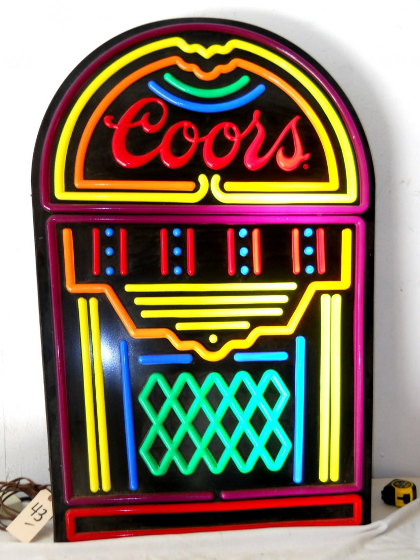 COORS BEER Neo-Neon Sign: Vintage Coors Beer faux neon sign featuring a large jukebox. ½ of sign does not light up, may need new bulb. 48” H x 31” W