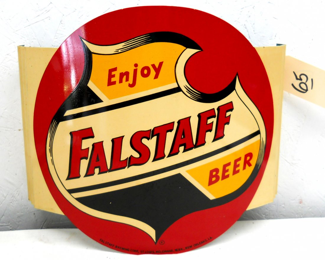 FALSTAFF BEER Wall Sign: Vintage enameled metal wall advertisement sign with red, black, yellow and cream Falstaff logo, curves out from wall. 15” H x 17.25” W x 5.25” D