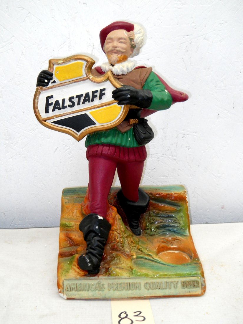 FALSTAFF BEER Chalkware Figure: Vintage FALSTAFF chalkware advertisement figure. Some paint missing, bottle missing, read's “America's Premium Quality Beer”. 16.5” H x 9.5” W x 7.5” D