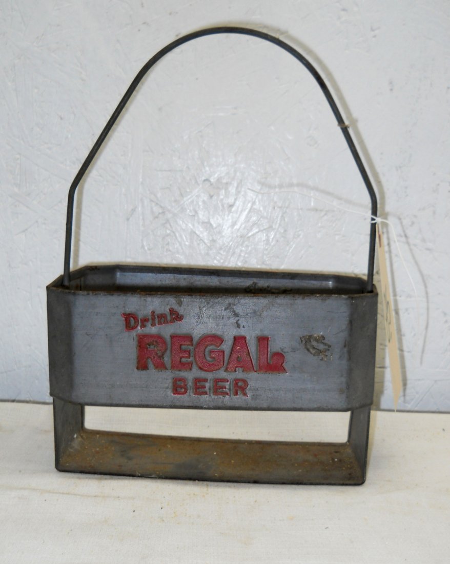 REGAL BEER Metal 6-pack Carrier: Vintage metal 6-pack carrier with Regal Beer advertisement logo on side. 11.5” H x 8” W x 5.25” D