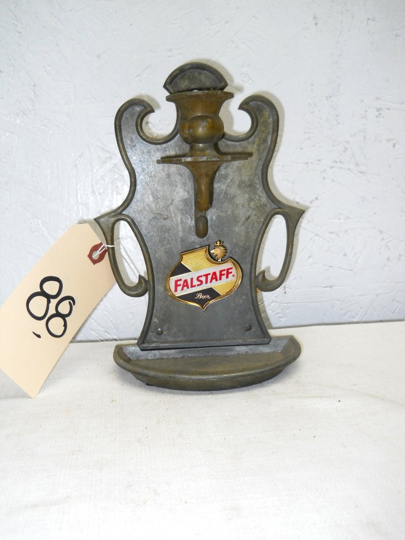 FALSTAFF BEER Candle Wall Sconce: Vintage FALSTAFF Candle Wall Sconse. Seems to be cast metal, with small Falstaff logo shield on front.9” H x 6” W x 3.5” D
