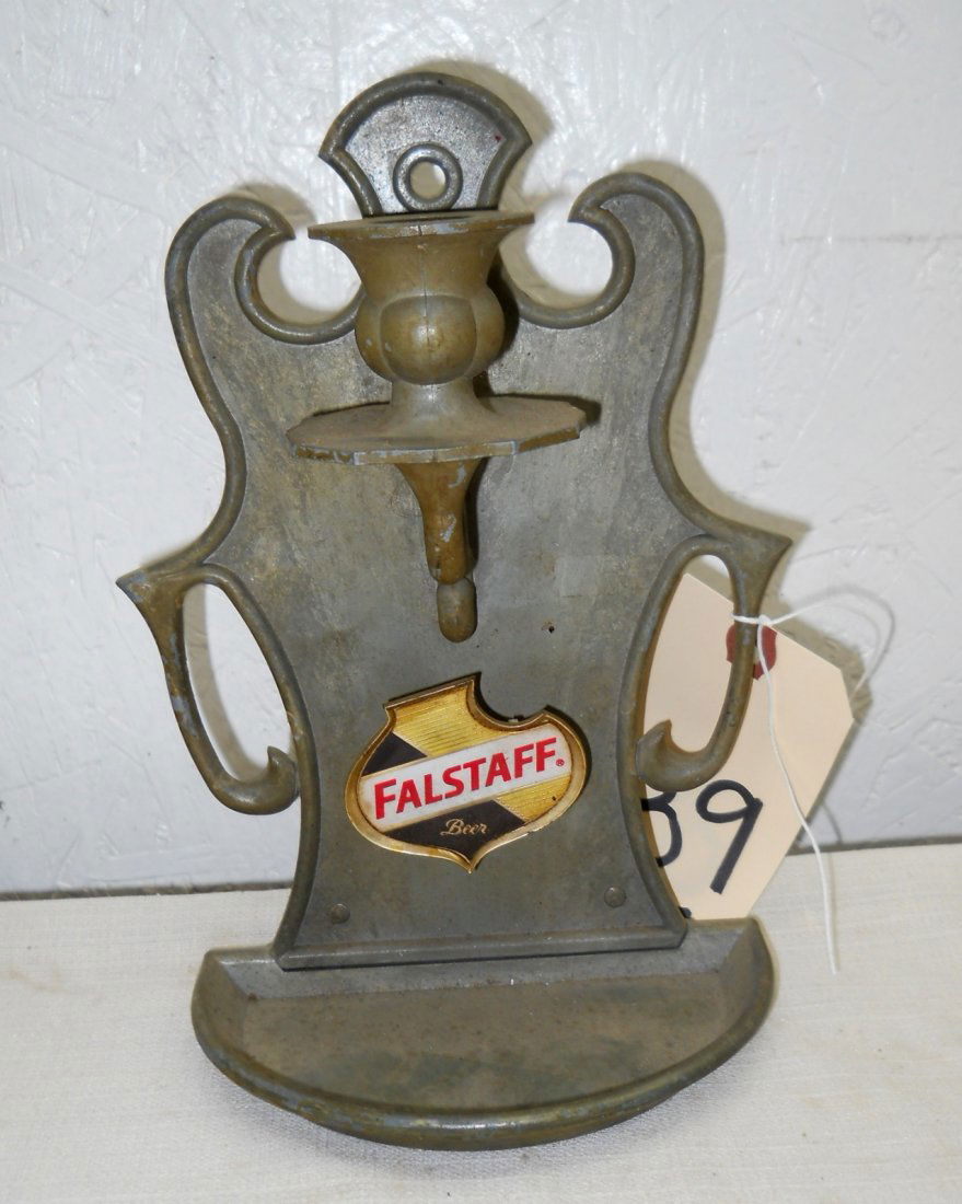 FALSTAFF BEER Candle Wall Sconce: Vintage FALSTAFF Candle Wall Sconse. Seems to be cast metal, with small Falstaff logo shield on front.9” H x 6” W x 3.5” D
