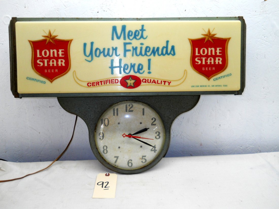 LONE STAR BEER Light Up Wall Display and Clock: Large vintage metal frame light up Lonestar Beer Logo advertisement sign with text “Meet Your Friends Here!” and a clock underneath. Sign does not light up, may need new flourescent bulbs but cloc