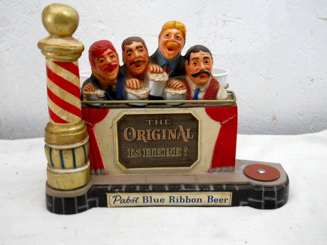 PABST BLUE RIBBON Bartop décor: Vintage advertisement scene of a Barber Shop Quartet drinking PBR, with a barber pole and the text “The Original Is Here”, light metal, WITH BEER BOTTLE, This one DOES HAVE two plastic drink cups
