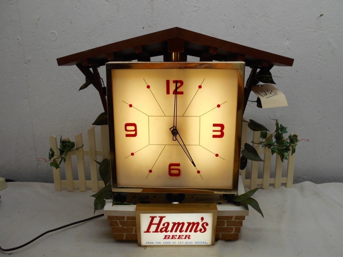 HAMM'S BEER Bartop Clock: Vintage HAMM'S BEER bar top advertisement clock with white picket fence and roof. Plastic fence is cracked where it attaches to house on right side
