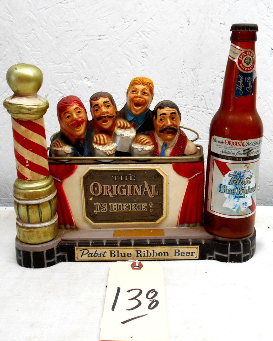 PABST BLUE RIBBON BEER Bartop Décor: Vintage PABST BLUE RIBBON BEER bar top decor. Barber Shop Quartet drinking PBR, with a barber pole the text “The Original Is Here”, light metal WITH PLASTIC BEER BOTTLE (broken at bottom, still st