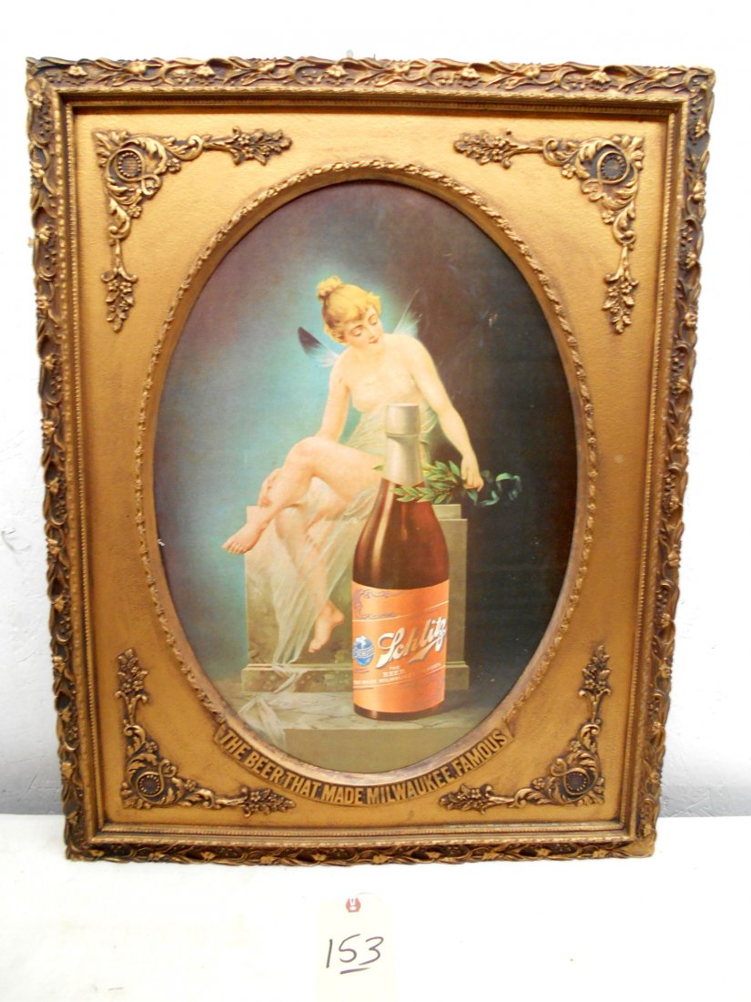 SCHLITZ BEER Framed Wall Print: SCLITZ BEER framed advertisement print on paper with plastic frame, depicting fairy on pedestal with large beer bottle. 28” H x 22.5” W x 1” D