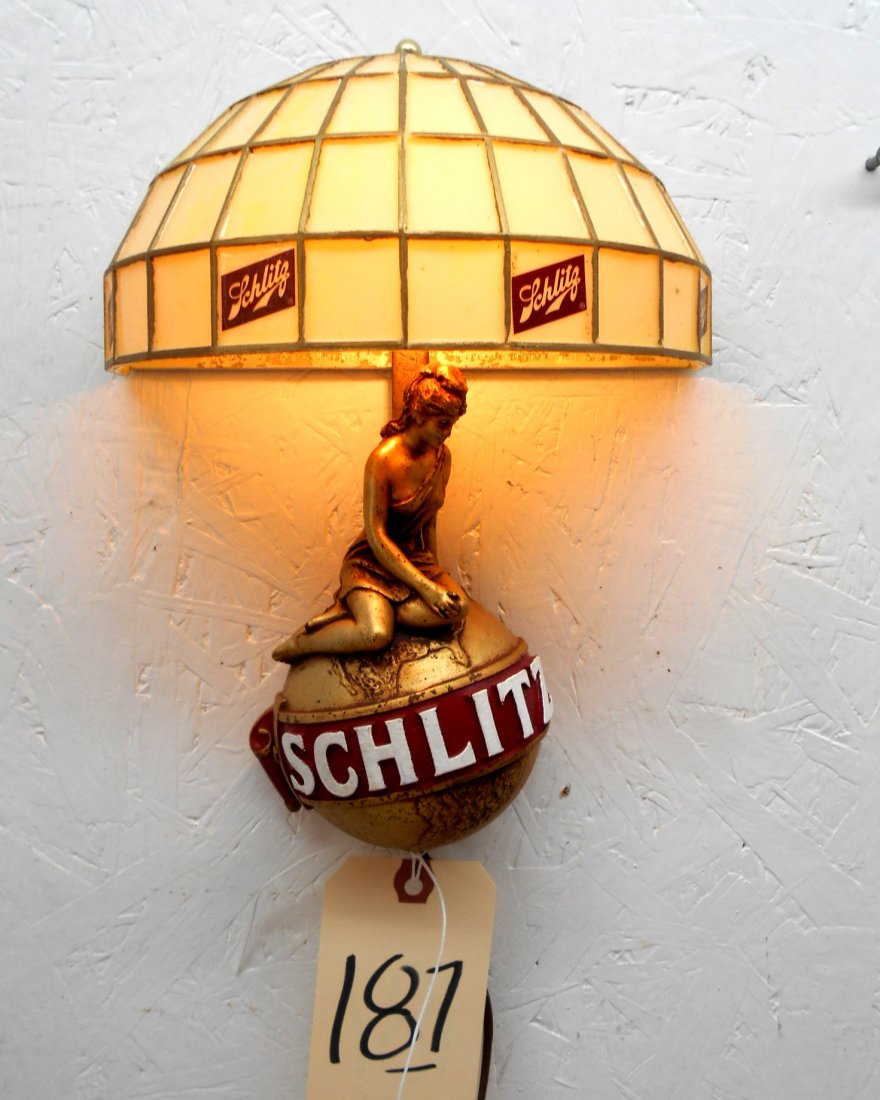 SCHLITZ BEER Light Sconce: Vintage SCHLITZ Light Sconce with Faux Stained Glass shade. Golden girl series, girl sitting on globe, Works, light turns on. 11” H x 8” W x 4” D