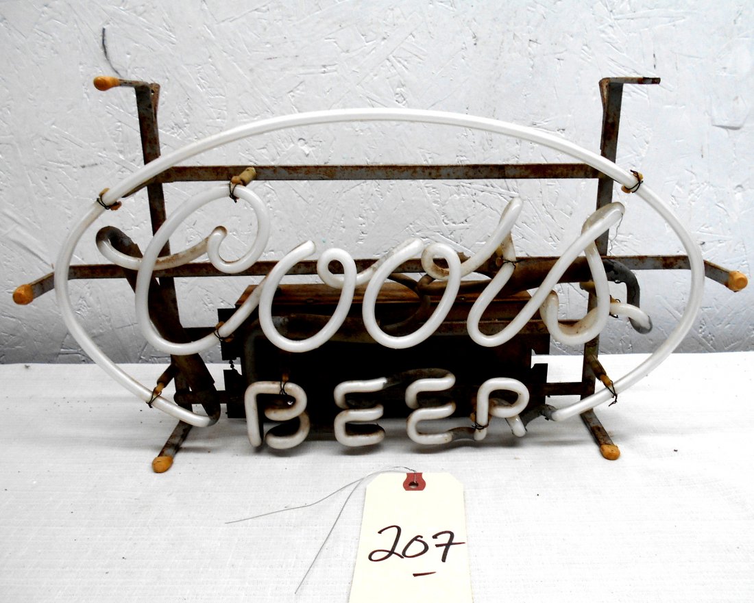 COORS BEER Neon Sign: Vintage COORS BEER neon sign advertisement. Simple oval with the words "Coors Beer". Very old, glass intact, appears to be in good condition. CORD MISSING 9.5" H x 17.5" W x 4.75" D