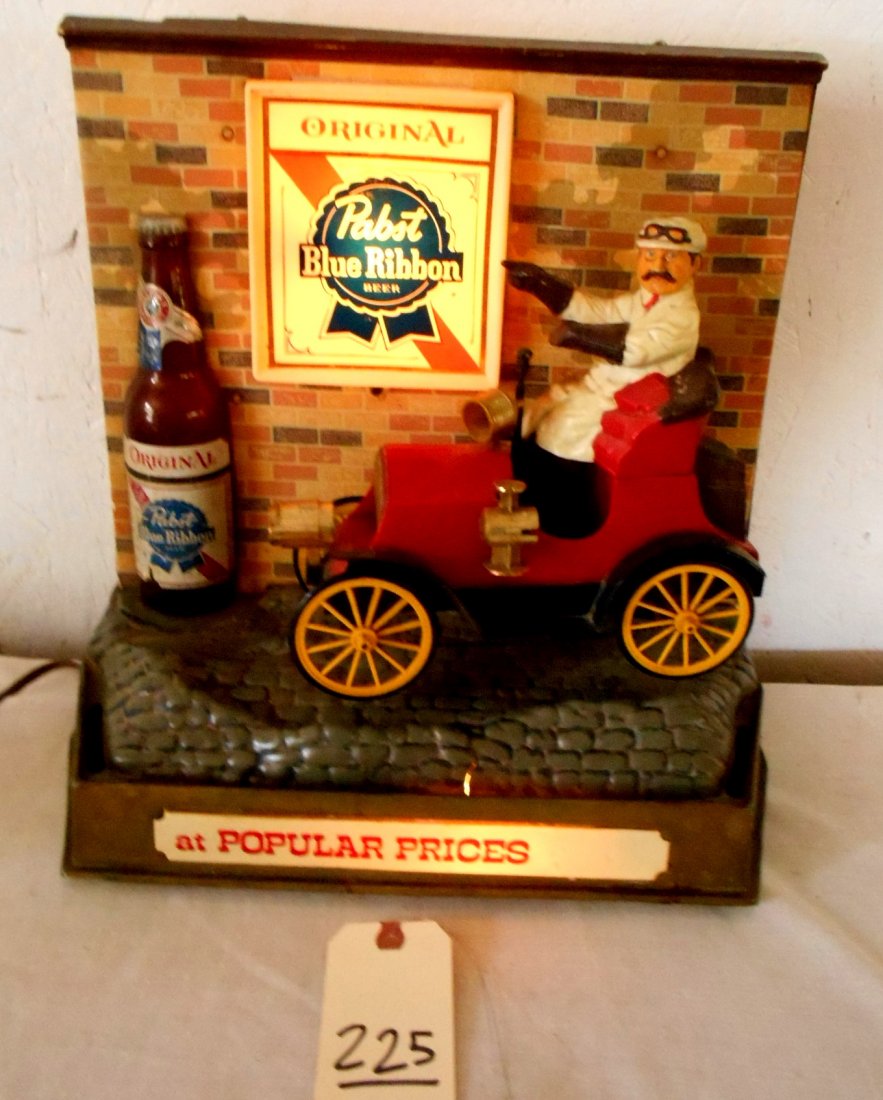 PABST BLUE RIBBON Animated Bartop dÃ©cor: Vintage PABST BLUE RIBBON BEER animated bar top dÃ©cor advertisement. Old Timey Car, works. Wheels turn and car rocks back and forth, leaning driver in to point at PBR sign. White Pabst sign on back