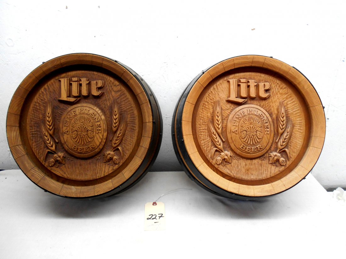 MILLER LITE BEER Barrel Wall Hanging: MILLER LIGHT BEER barrel advertsiements. Two round faux barrel wall hanging with Miller Lite logo. Set of 2. 17" Diameter x 6" Deep