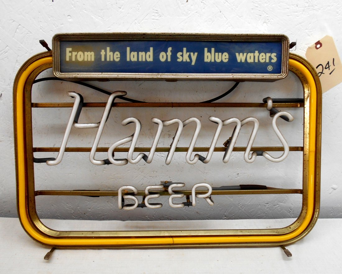 HAMM'S BEER Neon Sign: Vintage HAMM'S BEER neon advertisement sign "From The Land of Sky Blue Waters". Yellow neon border with white letters in center that read "Hamm's" Yellow neon is loose, NEEDS TO BE REWIRED and MISSING