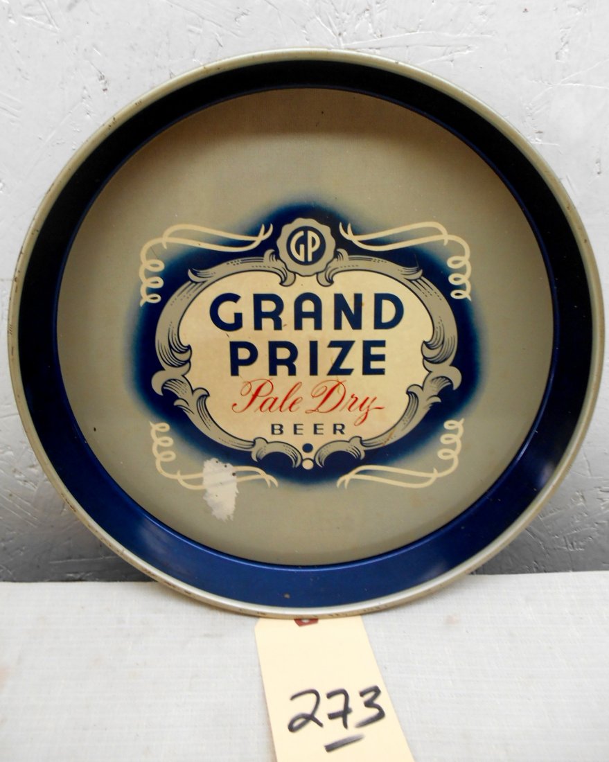 GRAND PRIZE BEER Tray: Vintage metal beer serving tray advertisement. Large Grand Prize logo in center. Great collector's piece! Some minor paint losses on front, bottom left of image. 12" diameter x 1"
