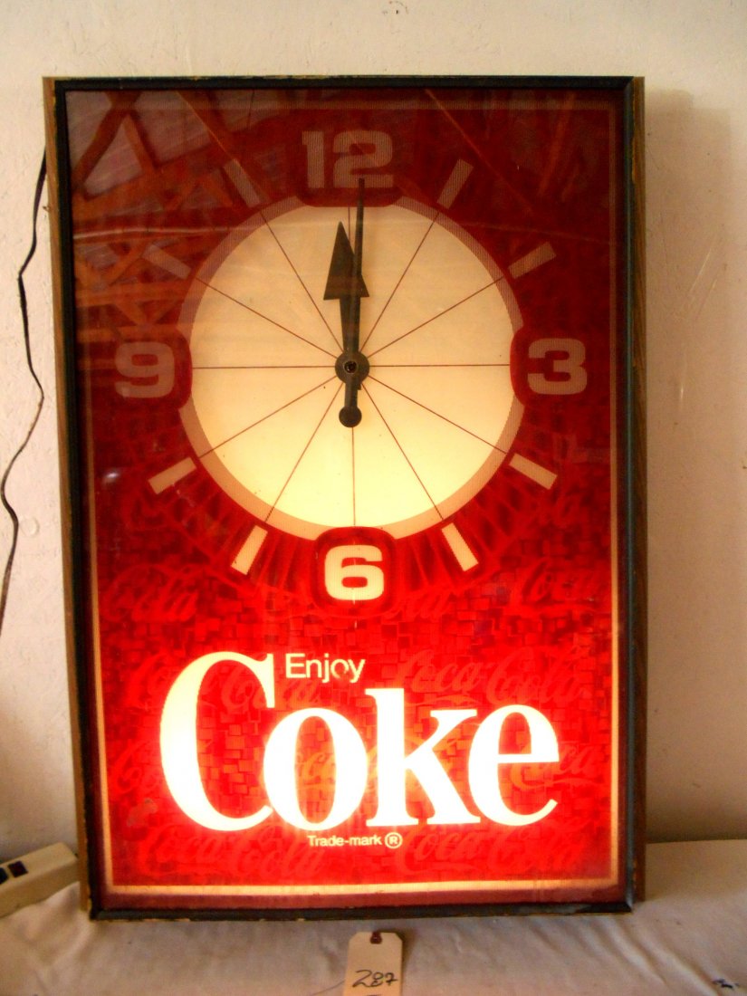 COKE Wall Clock & Sign: Very large vintage Coke wall clock with slogan, "Enjoy Coke" in large letters. There is a 3D-hologram effect in the background which repeats the words, "Coca-Cola. Large clock face. Clock runs. Wood f