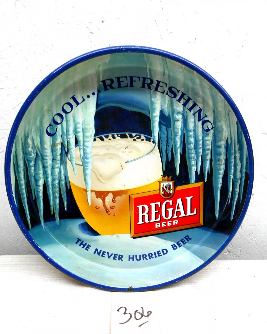 REGAL BEER Tray: Vintage round metal tray advertisement with Regal Beer logo and a frozen beer glass with icicles. Good condition. 13.25" diameter x 1.75" D
