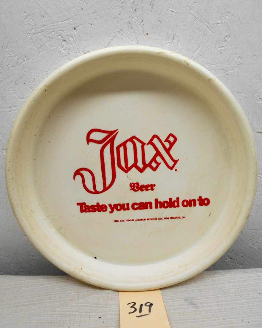JAX BEER Tray: Vintage JAX BEER plastic beer Serving tray advertisement. Round white plastic beer serving tray with red letters. Large Jax logo and the text, "Taste you can hold on to". 13" diameter x 1.5" D