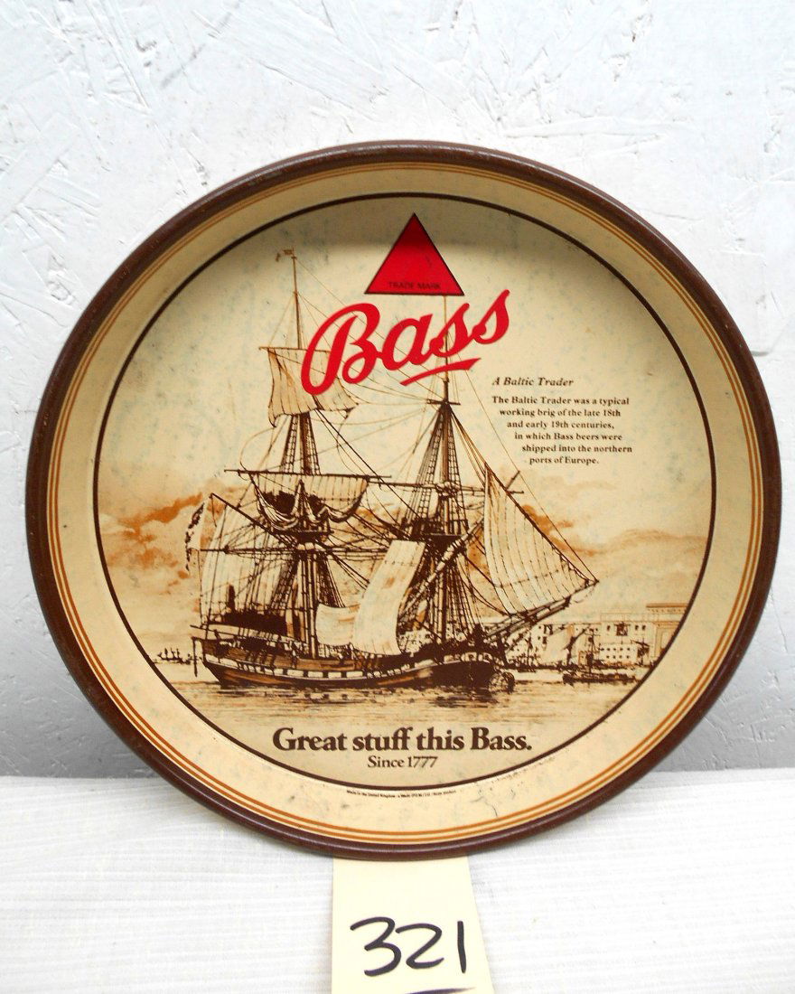 BASS BEER Tray: Round BASS BEER metal serving tray advertisement with Bass Beer logo and drawing of a large ship and the text, "Great stuff this Bass, Since 1977". 12" diameter x 1.25" D