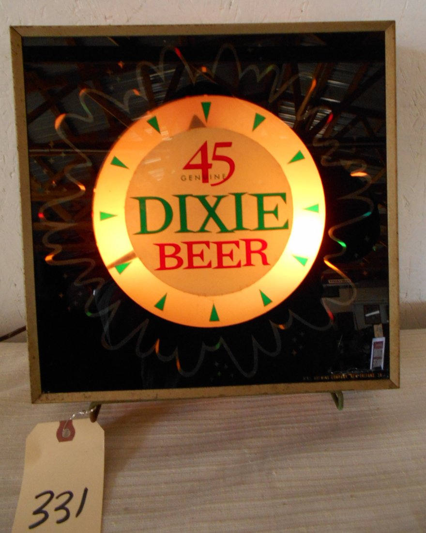 DIXIE BEER 45 Clock: Vintage square DIXIE BEER wall clock with retro Dixie Beer logo on front. Metal housing and glass clock face. Great condition for age! 12.5" H x 12.5" W x 4.5" D