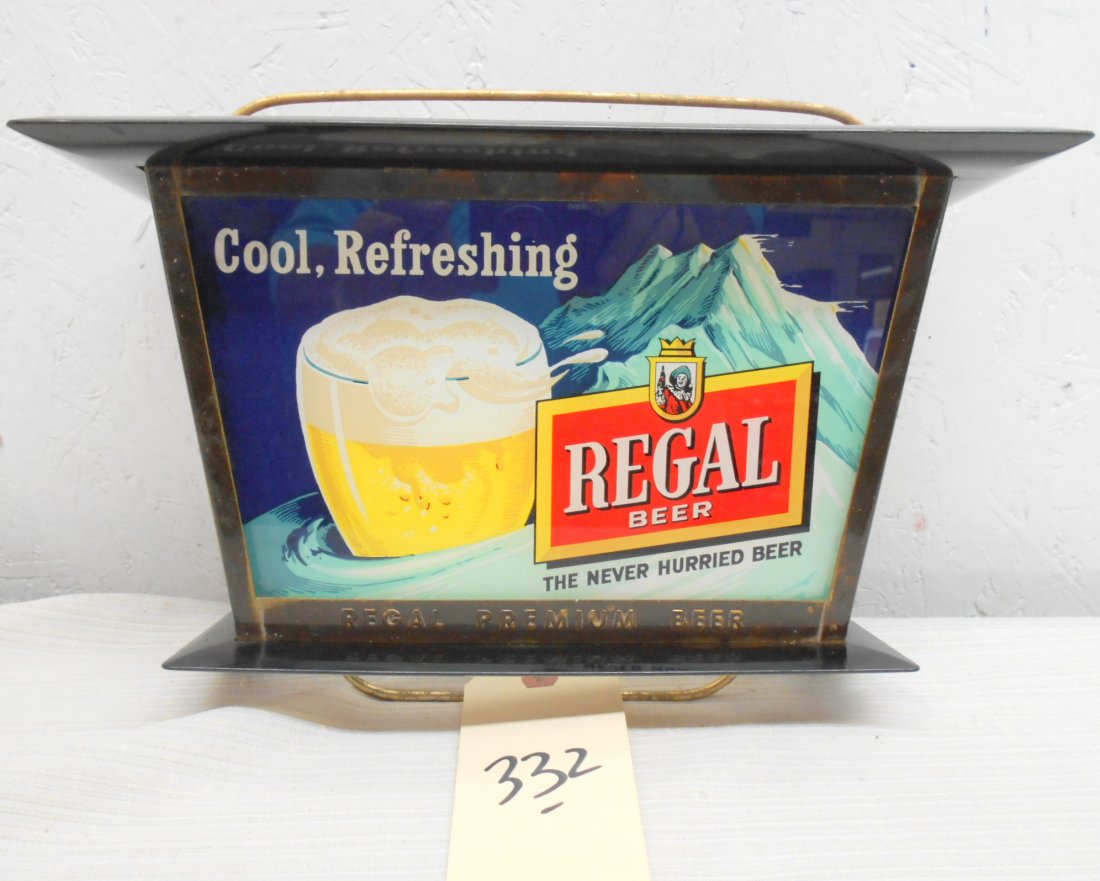 REGAL BEER Wall Pocket: Vintage REGAL BEER wall pocket advertisement or stylized model of a bar? Metal framed wall pocket with plastic picture panels with Regal beer logo and images of icy beer and mountains. 8.75" H x 13.5"