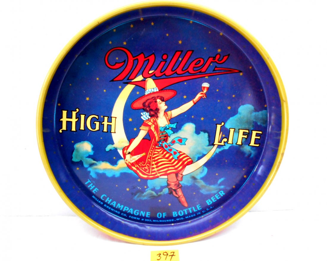 Miller High Life Beer Tray: Vintage Miller Beer tray. "Miller High Life, The Champagne of Bottle Beer". Color and graphics great. Little sign of wear on front. Back with some minor scuff and scratches from use. 12" diameter X 1 
