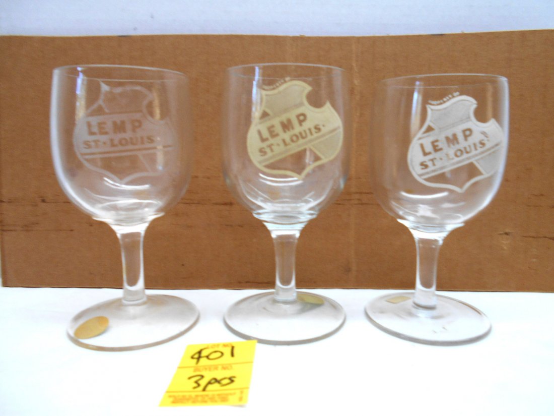 LEMP Beer Goblets: 4 pcs. Antique pre-prohibition Lemp Beer goblets. No chips or cracks. Etched shield. Some yellowing of one goblet's shield. 5 3/4" tall.
