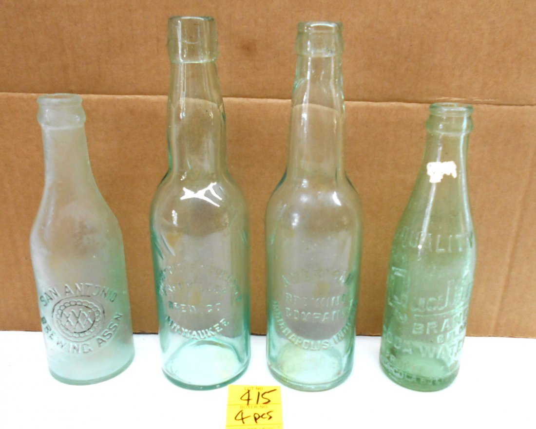 Assorted Green Glass Beer Bottles & Soda Water Bottle: 4 pcs. Vintage beer bottles and soda water bottle. 1 "San Antonio Brewing ASSN XXX", 1 "Fred Miller Brew. Co. Milwaukee", 1 "American Bewing Company Indianapolis", 1 "Quality Brand 6 fl. oz. Soda Wate