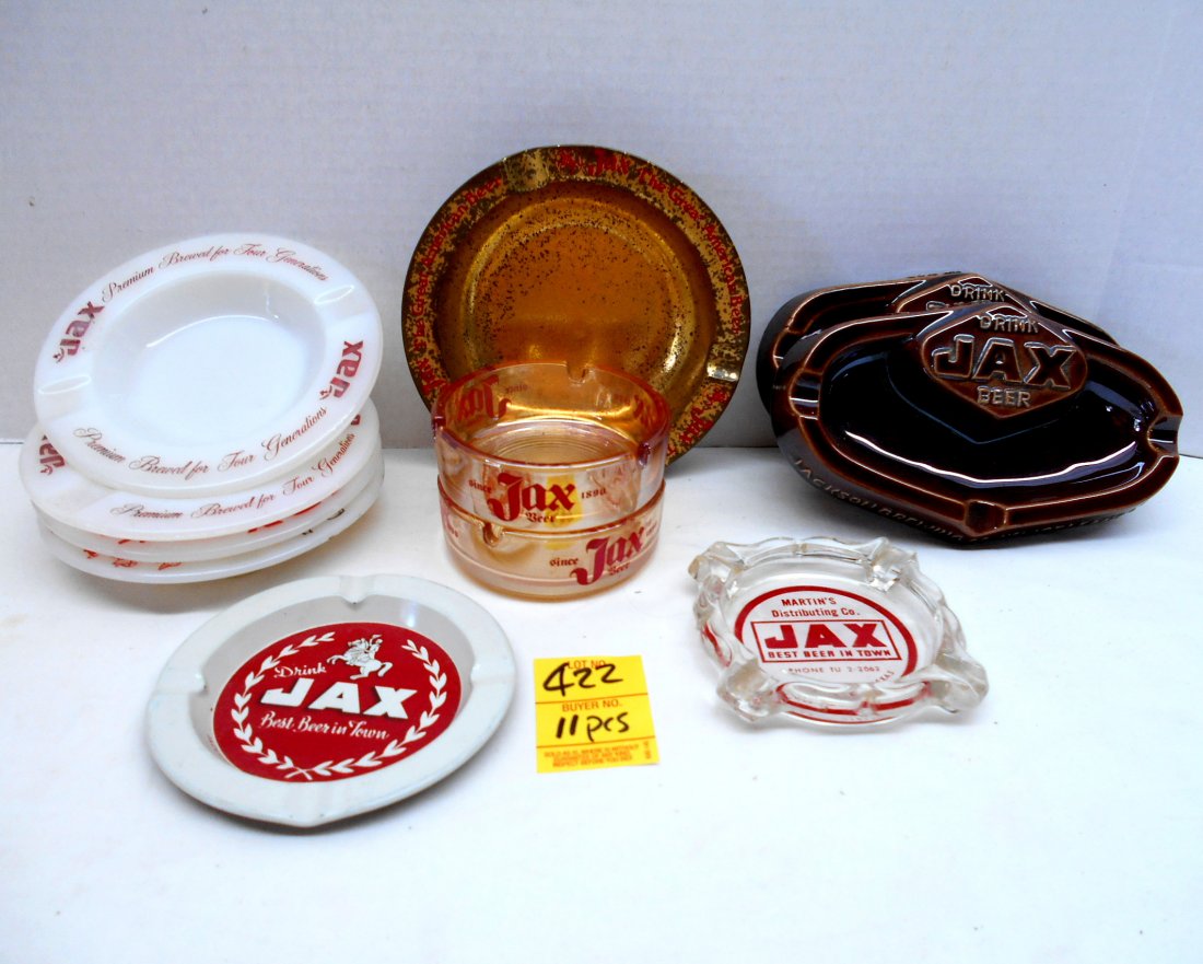 JAX BEER Misc. Ashtrays: 11 pcs. Vintage beer advertisement ashtrays. 2 brown ceramic 3.75"X6.5"X1.25", 7 glass 4.5"-5.25", 2 metal 4.5"-5.75". No chips or cracks on glass or ceramic.