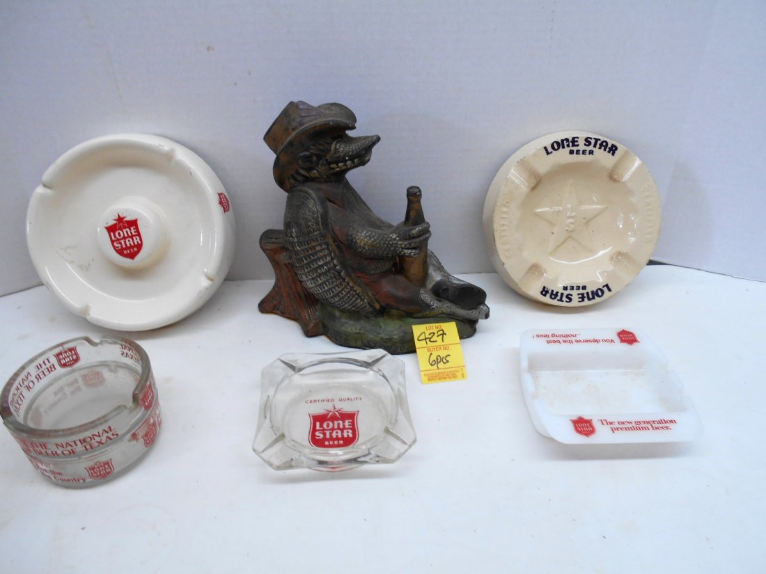 LONE STAR BEER Misc. Ashtrays & Armadillo Figure: 7 pcs. Vintage beer advertisement. Armadillo Figure holding bottle of Lone Star signed "Deep Flex 1980" chalkware "“ some flecks of paint missing 7.5"X8"X3.75", 2 large ashtrays 6"X1", 4 small glass