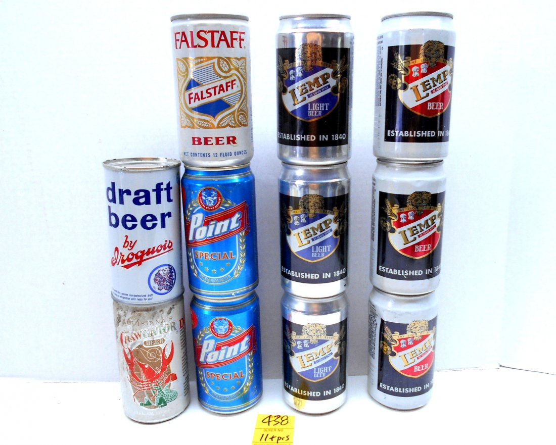 Misc. Beer Collectibles: 11 pcs. Vintage beer advertisement. FALSTAFF, LEMP, IROQUOIS, POINT SPECIAL, CRAWGATOR BEER cans and a box of 4 Beer Can Collectors Price Catalogs, Patches, emphemers, etc.
