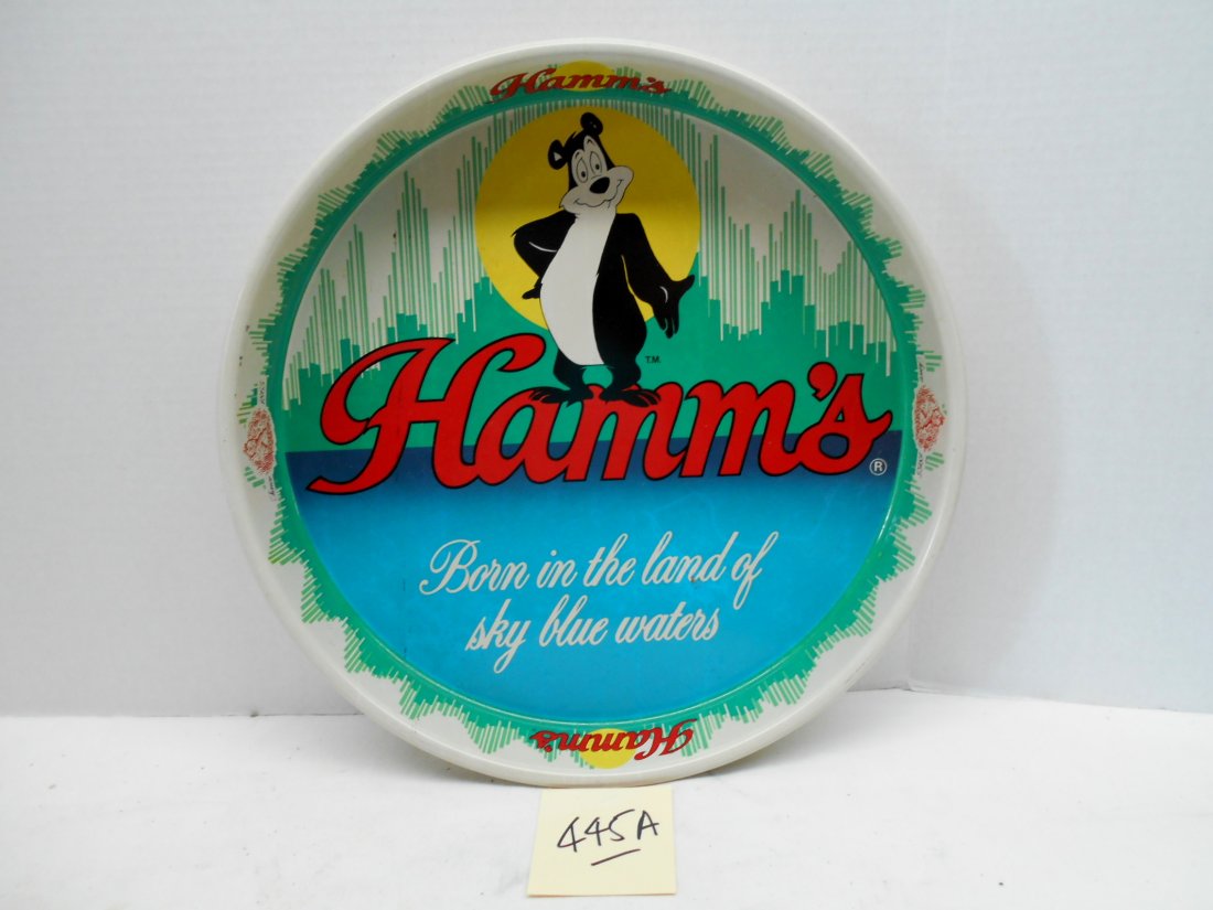HAMM'S BEER Tray: Vintage metal Hamm's Beer tray advertisement. Bear logo with "HAMM's, Born in the land of sky blue waters" 13 1/4" dia x 1 Â½' deep.