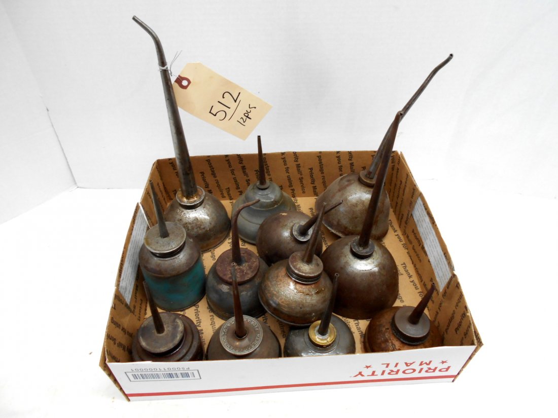 Antique Oil Cans - Squirt: 14 pcs. Assorted antique squirt can oil cans. Measuring from 5.25" - 12"