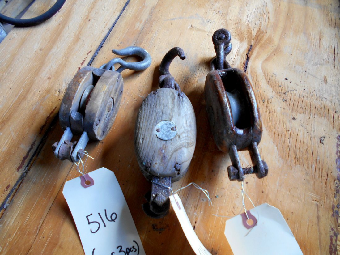 Antique Block & Tackle: Three small wood single pulley. One with no hook and round metal tag with embossed pitch fork. 8 1/2" x 2 3/4" x 1 1/2"