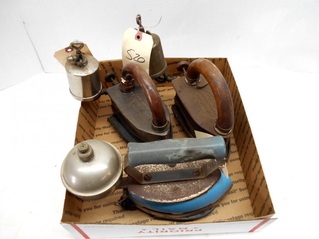 Antique Steam Irons: 3 pcs. Two of the irons read "Imperial Self-Heating Flat Iton", the other is Coleman brand. All come with trivets, unsure if trivets are original to irons.